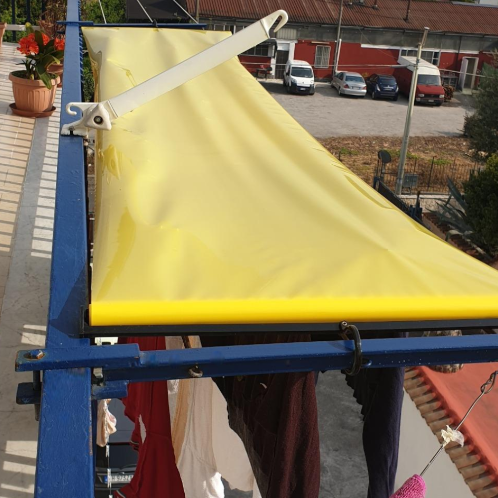Telo copribucato plastificato impermeabile giallo rullo 5 metri con ganci da balcone esterno