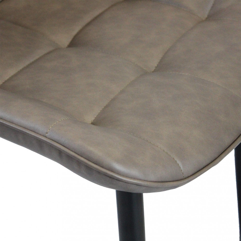 Sedia larga da interno sala da pranzo con struttura in metallo e seduta morbida rivestita in ecopelle No Arm