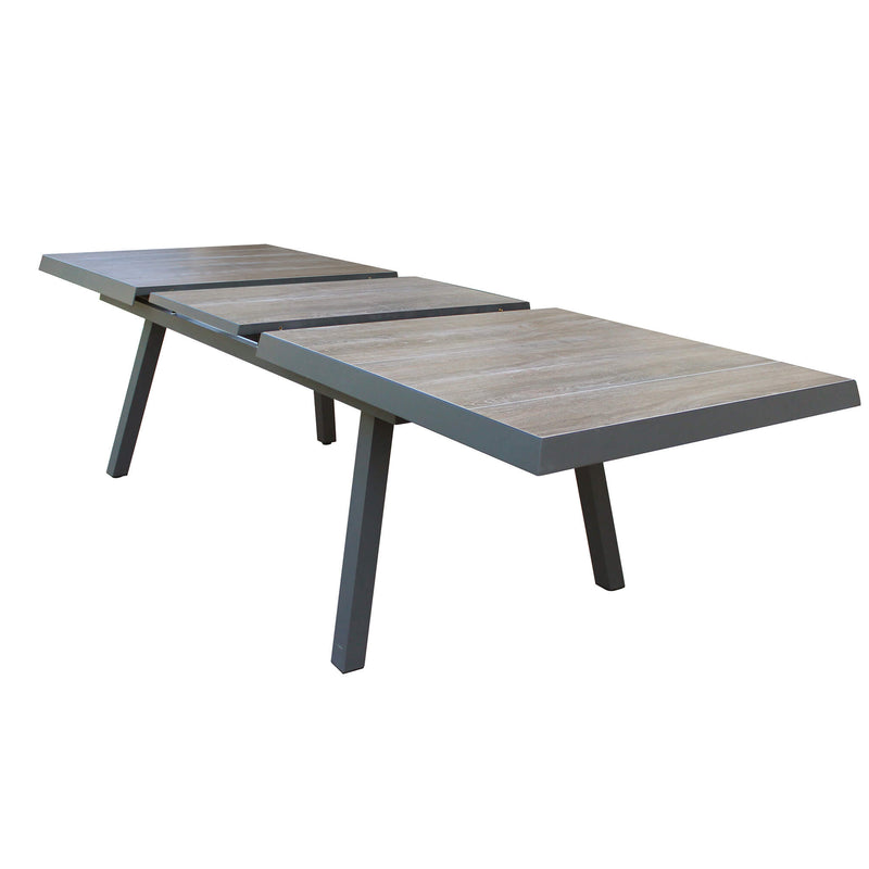 Tavolo allungabile per esterno in alluminio con piano in gres effetto le