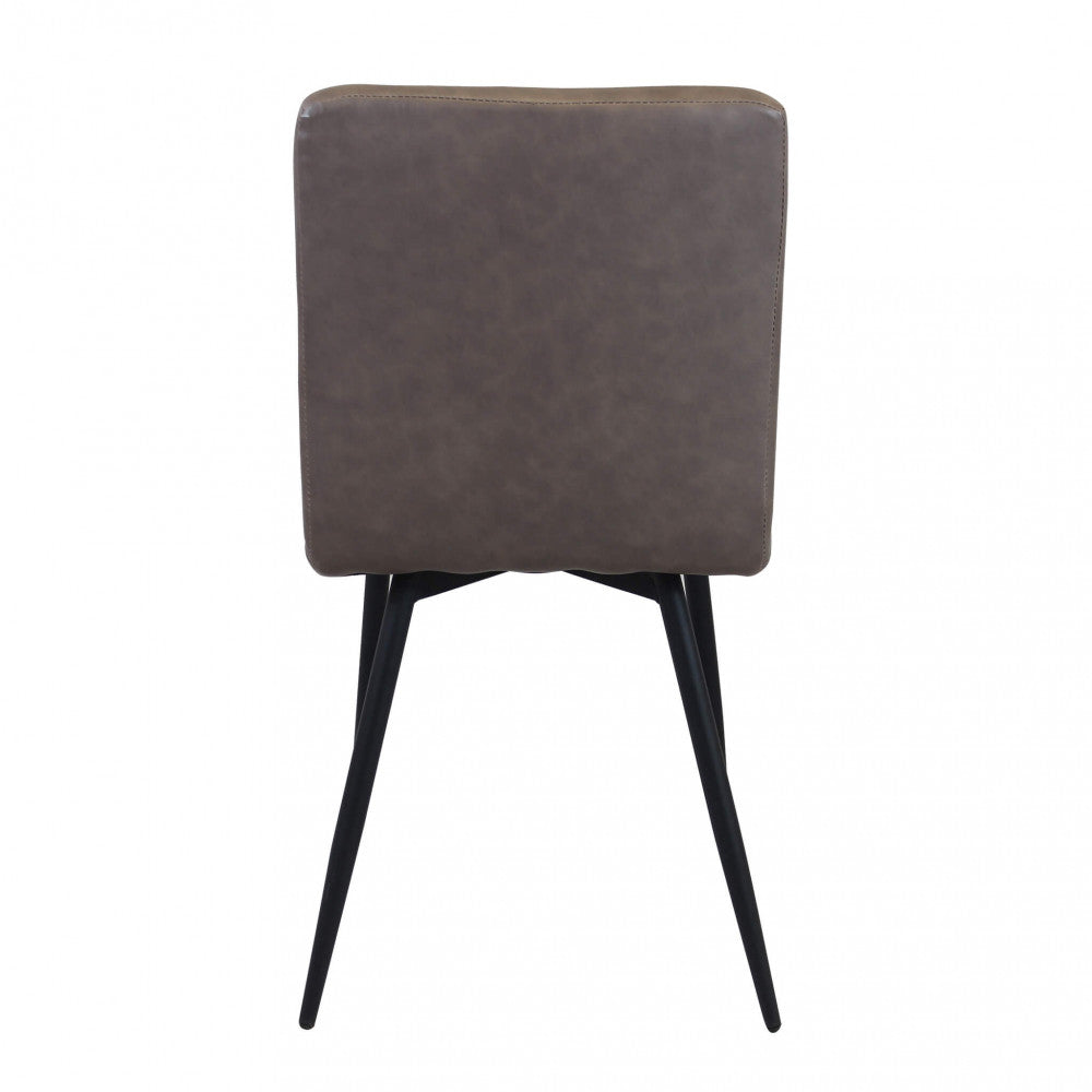 Sedia da interno sala da pranzo con struttura in metallo e seduta larga rivestita in ecopelle Ginter