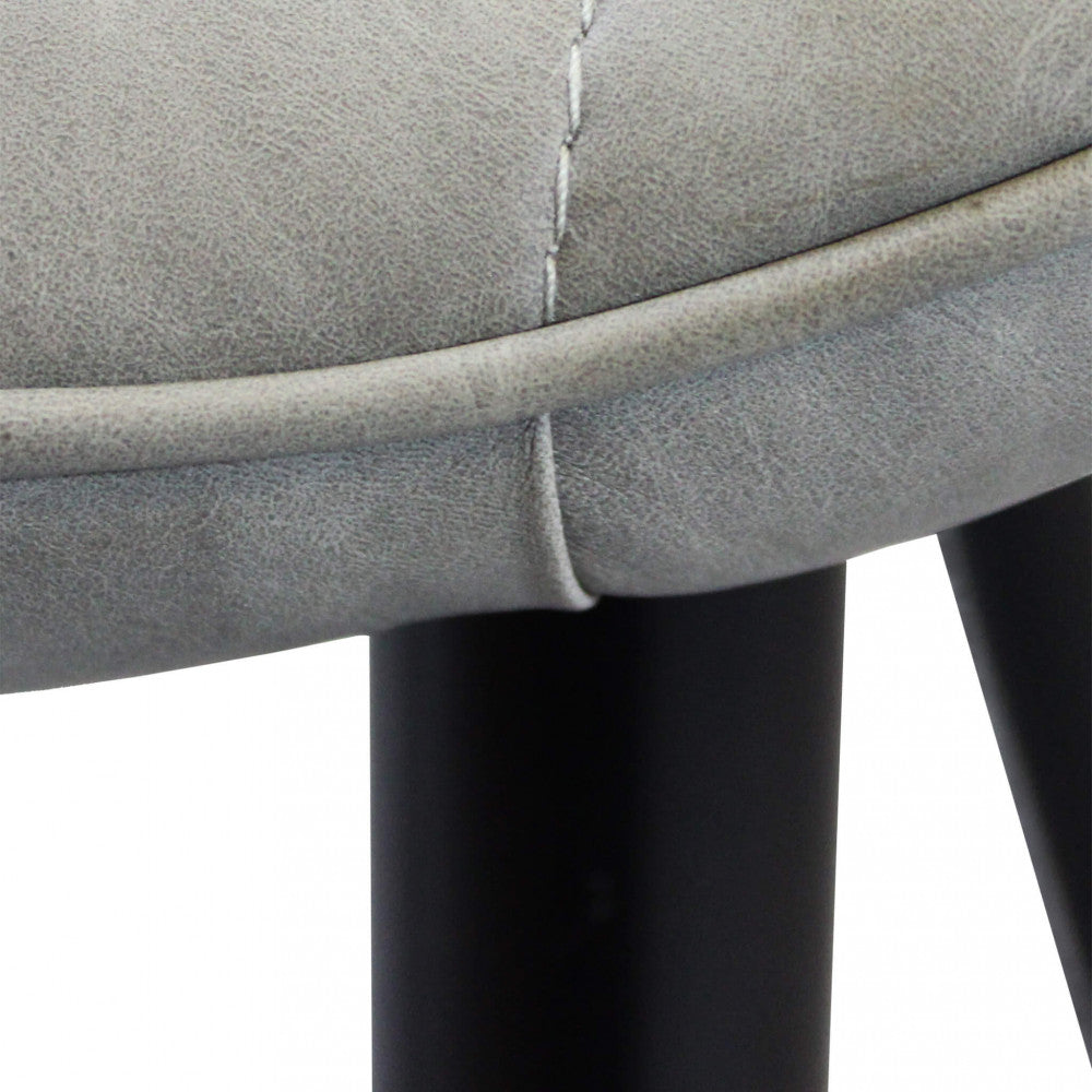 Sedia larga da interno sala da pranzo con struttura in metallo e seduta morbida rivestita in ecopelle No Arm