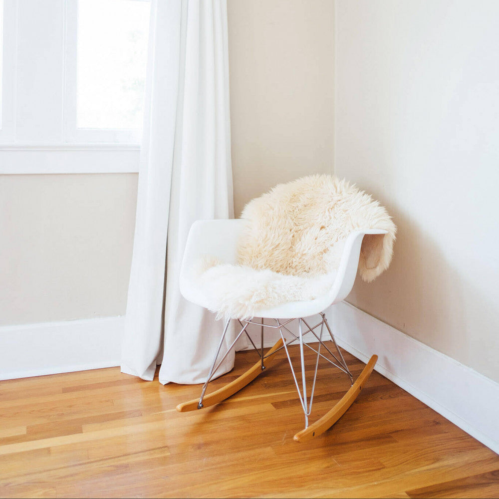 Sedia poltrona a dondolo da interno ufficio salotto con struttura in acciaio e seduta in ABS Julian