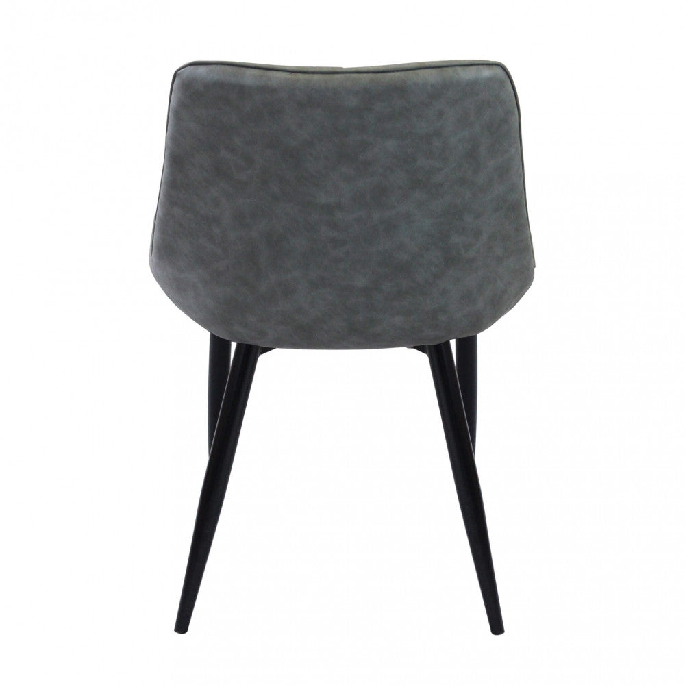 Sedia larga da interno sala da pranzo con struttura in metallo e seduta morbida rivestita in ecopelle No Arm